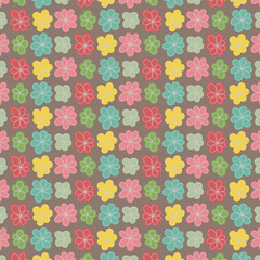 Cute multicolor flower pattern on a taupe background with simple outlined petals, perfect for children’s fabrics, wrapping paper, and cheerful decorative themes.