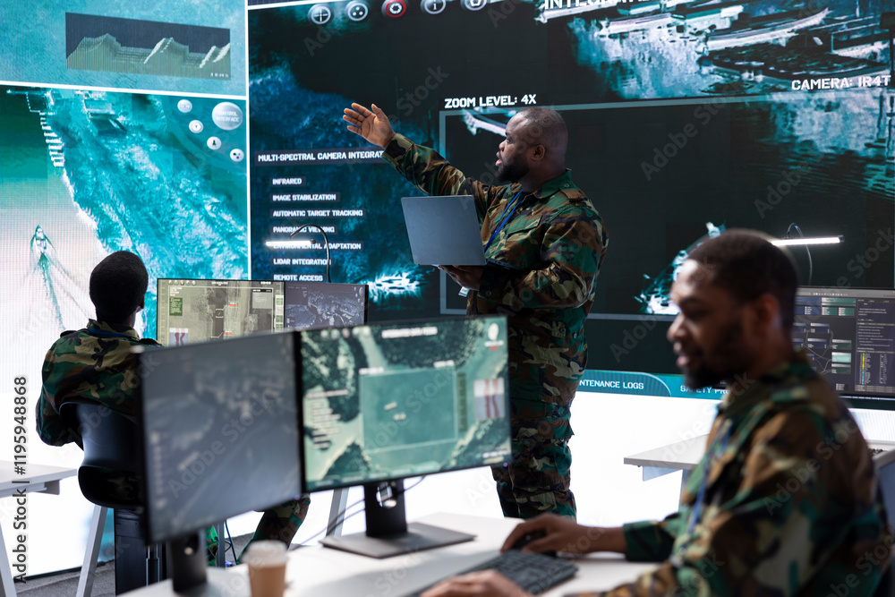 Aufkleber group of soldiers in a secure office environment collaborates on intelligence analysis, data process