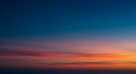 Fototapeta premium Breathtaking Sunset Sky with Vibrant Orange and Pink Hues