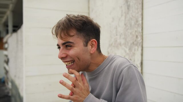 Boy Smiles Mischievously While Hatching a Diabolical Plan Outside