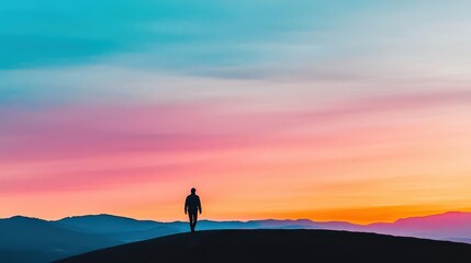 Fototapeta premium A traveler walking along a desert dune at sunset, dramatic and serene mood