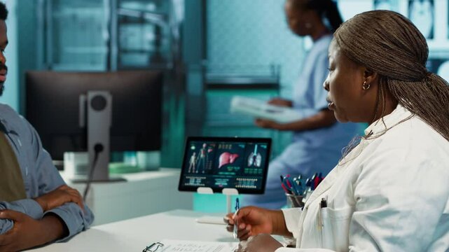 African american doctor and patient having in depth conversation about medical results, leveraging health reports to devise a wellness and treatment plan. Recommends list of medication. Camera A.