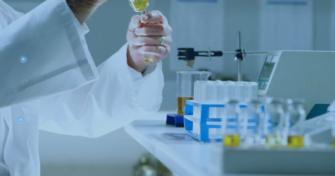 Image of network of connections over caucasian male scientist