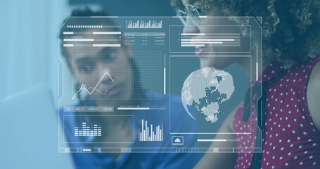 Image of processing data interface over diverse colleagues at laptop in office