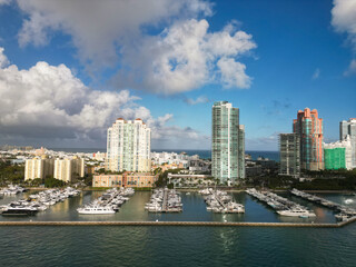 Naklejka premium Luxury South beach marina. Miami south beach view. Docked luxurious yacht boat. Luxurious lifestyle. View of luxury Miami Biscayne Bay Florida. Biscayne bay. Summer vacation. Marina lifestyle