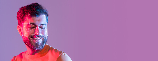 A man with a beard smiles while a facial recognition overlay highlights key features. The vibrant background adds a modern touch, showcasing advances in identification technology.
