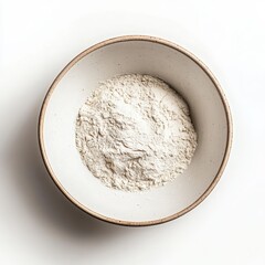 a bowl of flour on white background