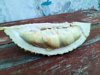 Close up durian in wooden table.
