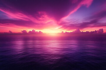 Obraz premium Vibrant pink sunset over calm ocean.