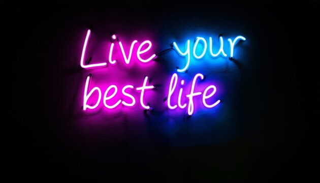 Vibrant Neon Sign 'Live your best life' glows with pink, blue and green against a deep black background