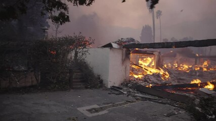 Homes burning down in the Palisades fire 