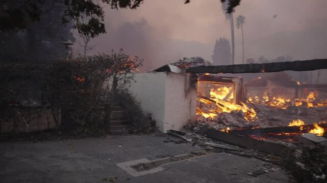 Homes burning down in the Palisades fire 