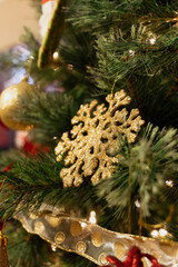 Beautiful gold snow tree decoration for christmas season.