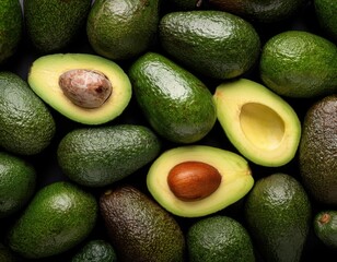 Green ripe avocado top close up view. Texture vegan healthy food background. Diet organic vegetable poster photo