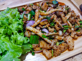 This image of mushroom larb radiates a feeling of homemade goodness and care.