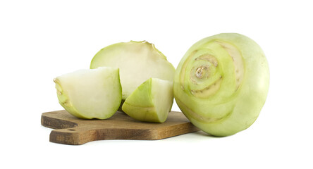 Fresh Kohlrabi Whole and Sliced Displayed on Wooden Cutting Board