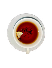 A close-up overhead shot of a steaming cup of black tea, garnished with a slice of fresh lemon,...