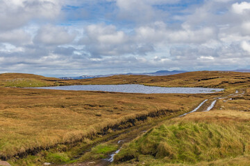 Scotland, Hebrides. Isle of Lewis, Aird Uig. Rutted dirt road to Loch a' Rubha Chaoil. Moorland.