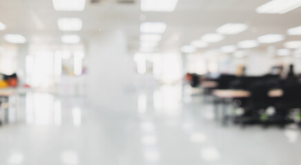 Obraz premium Abstract blurred white office room background with bokeh lights at office interior.