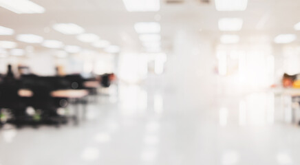 Abstract blurred white office room background with bokeh lights at office interior.