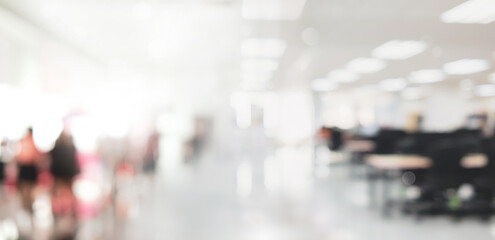 Abstract blurred white office room background with bokeh lights at office interior.