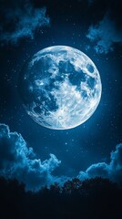 Full moon rising over a silhouetted landscape.