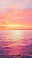 Obraz premium Pink sunset over calm ocean waters