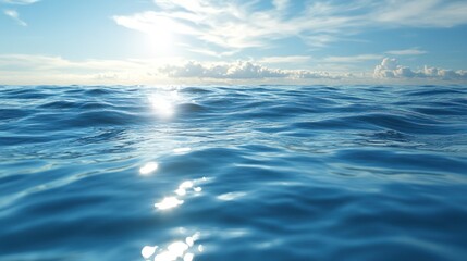 Obraz premium Serene ocean waves glisten under a bright sun with fluffy clouds in a tranquil seascape background