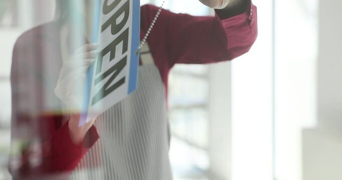 Business closures in the center are welcomed by the sign open instead of closed