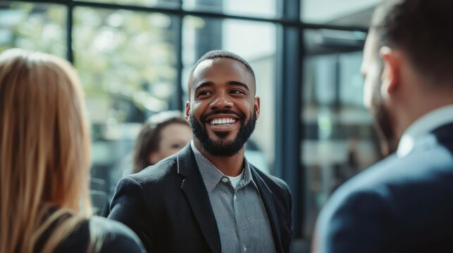 A leader giving credit and recognition to employees in a modern, respectful office setting.