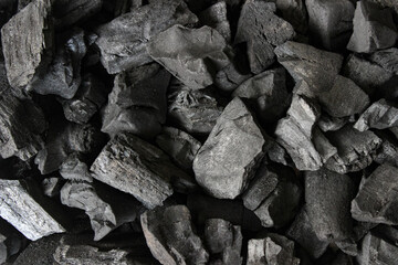 Full view of Charcoal preparation for barbeque. Charcoal texture background