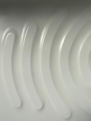 Obraz premium Background of curved colored lines of basin on white background.