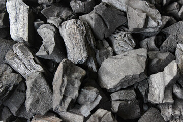 Full view of Charcoal preparation for barbeque. Charcoal texture background