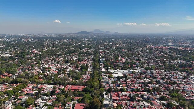 Southern part of Mexico City on a sunny day filmed by drone