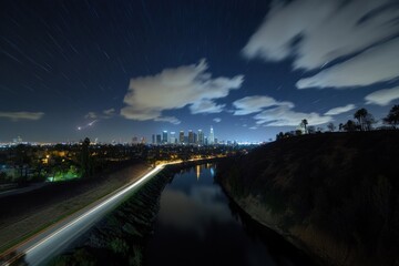 Fototapeta premium Los Angeles Nightscape: Star Trails Over City Skyline