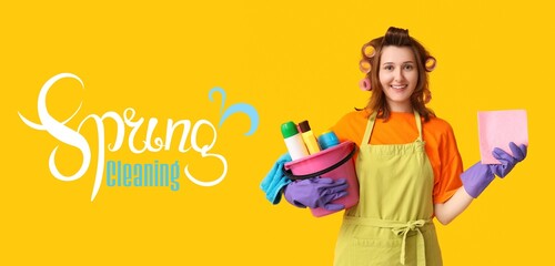 Young housewife with cleaning supplies on yellow background. Banner for spring cleaning