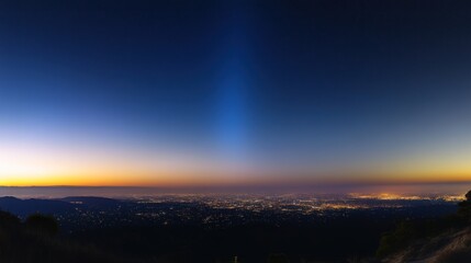Serene Twilight Cityscape: A Panoramic View from the Mountaintop