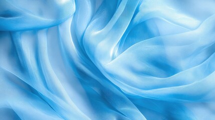 Obraz premium A soft, flowing fabric in a delicate light blue hue, exhibiting gentle waves and a smooth texture that creates an elegant appearance.