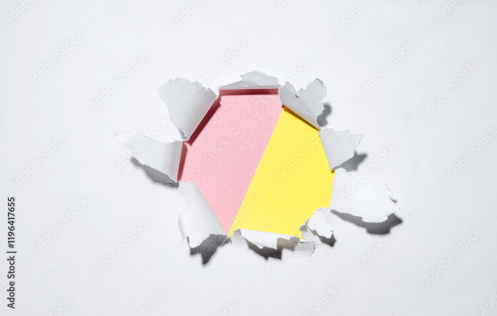 Poster top view of the hole from ripped white paper with a colored background. mockup. copy space. presenta