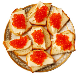 A plate of bread with red caviar on top