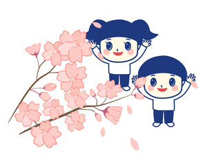 満開の桜の木を見上げる子供たち