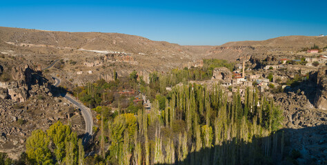 Panoramic view of Belisirma Village. It is one of the entry points of Ihlara valley. Travelling in Anatolia, Turkey. Tourist area near Cappadocia. Guzelyurt district, Aksaray province, Turkey country 