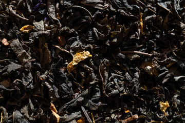 dry black tea leaves close up
