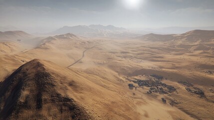 Naklejka premium Aerial view of a vast desert landscape with distant mountains.