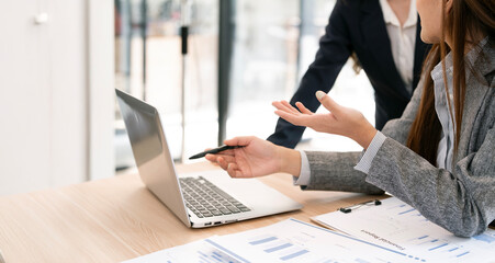 Business people Consulting meeting working and brainstorming new business project, using laptop at...