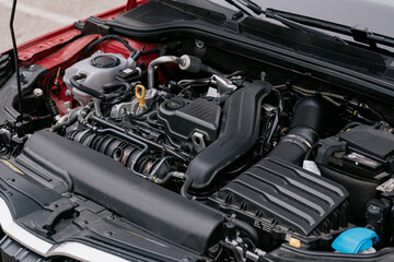 Fototapeta premium Close up view of a modern car engine showcasing its intricate details and components