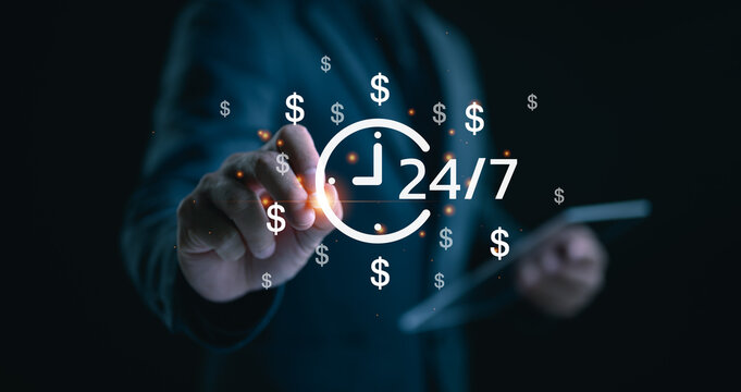 Time management concept. Work planning increases efficiency and reduced work time. businessman holding clock and money icon on interface virtual for business time management.