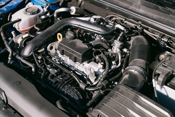 Fototapeta premium Close up view of a modern car engine showcasing intricate details and components