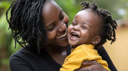 Fototapeta premium A parent laughing and playing with their child, showing a special bond and a sense of affection.