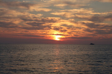 Sunset ocean sky Dusky swirling sky. High quality photo